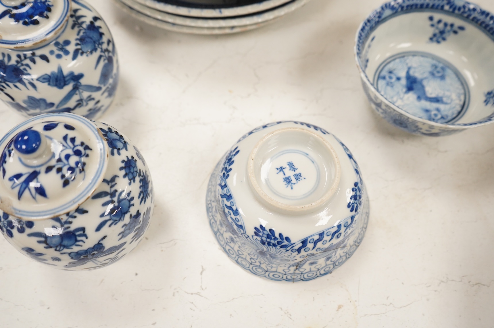 Group of blue and white Chinese porcelain and pottery to include dragon dishes and a pair of fish bowls, together with a pair of tin glazed vases, largest 21cm in diameter
